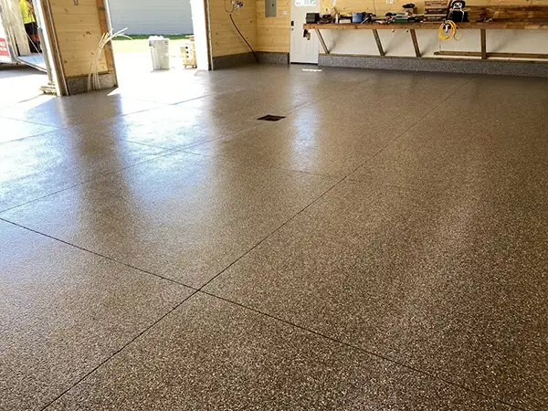 Garage floor after polyurea flake coating — Walchak Concrete project 3