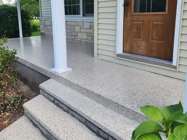 Patio after polyaspartic flake coating — Walchak Concrete
