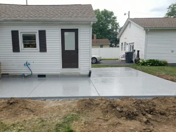 Pool deck after slip-resistant polyaspartic coating — Walchak Concrete