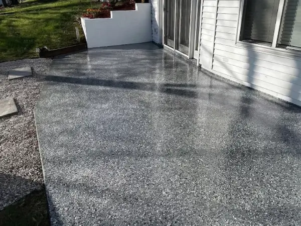 Outdoor walkway with UV-stable polyaspartic finish — Walchak Concrete