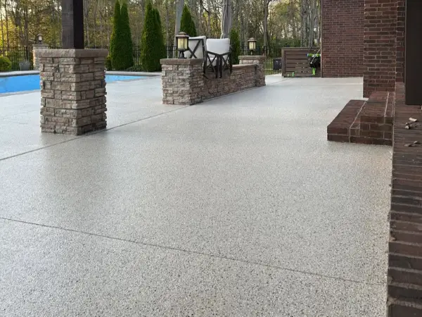 Porch after polyaspartic flake system — Walchak Concrete